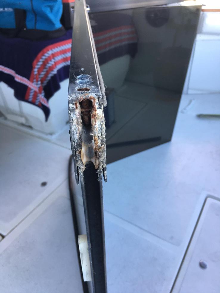 Corroded Roller in a door on a boat